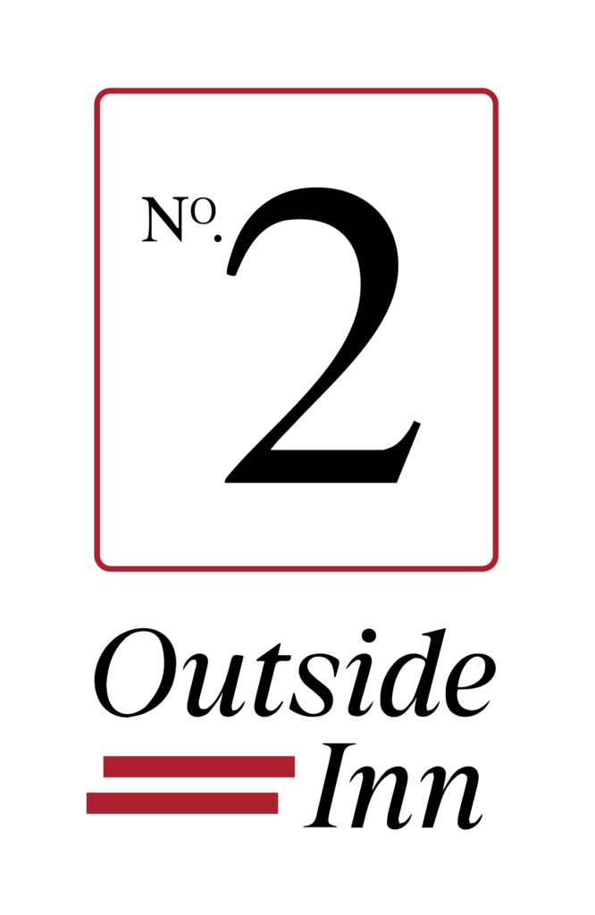 Outside Inn Cabin Signage